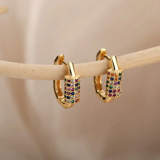 Elegant gold earrings with radiant multicolored zircons