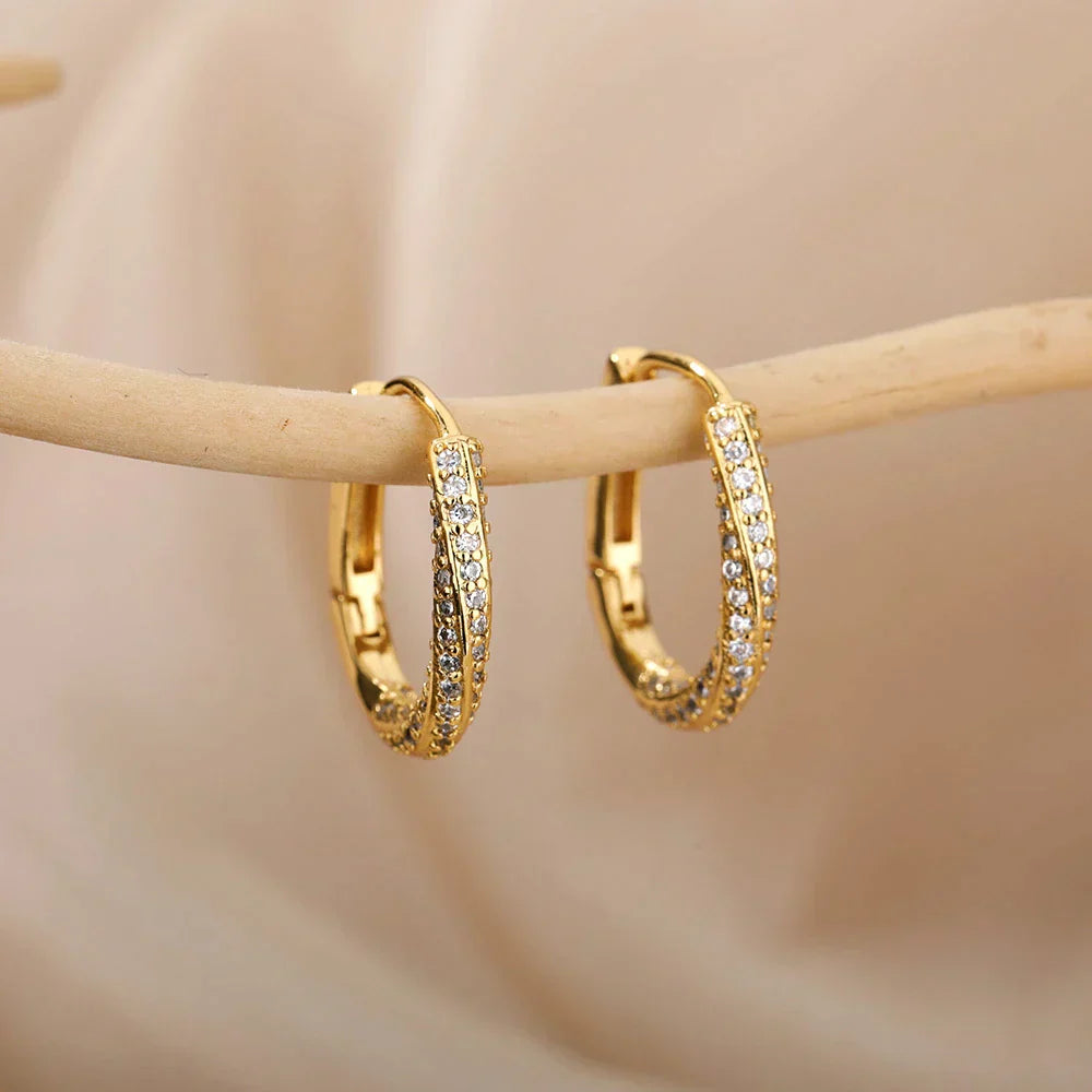 Elegant Shiny Gold Earrings in Irregular Design