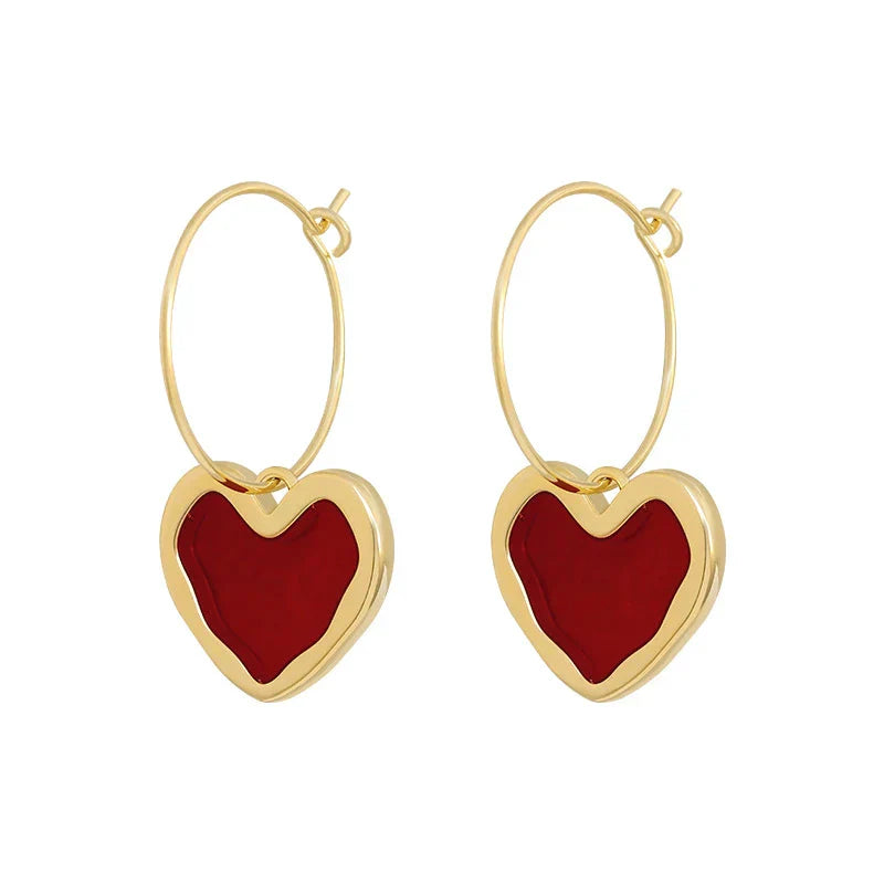 Elegant heart earrings made of fine gold