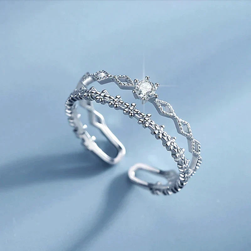 Elegant adjustable silver ring with sparkling zirconia