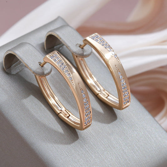 Elegant gold earrings with sparkling diamonds