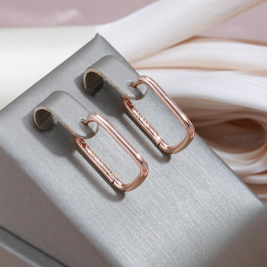 Simple Elegance: Golden Earrings with Sparkling Zirconia