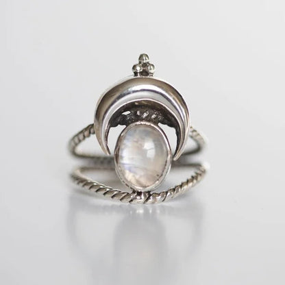 Captivating Oval Rainbow Moonstone Ring with Moon Phases Design