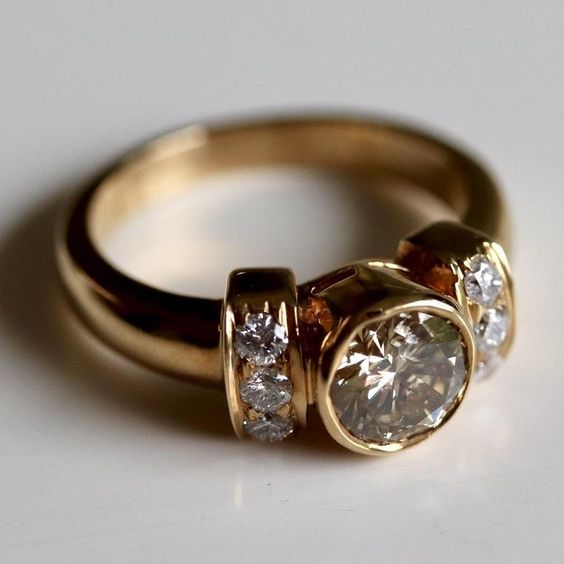 Elegant vintage ring made of forged gold with radiant shine