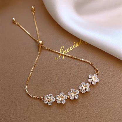 Golden Bracelet with Crystal Daisy Design