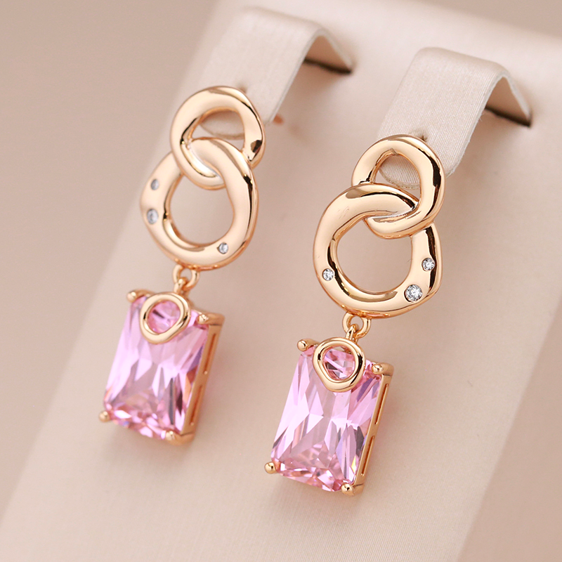 Elegant golden stud earrings with sparkling crystals