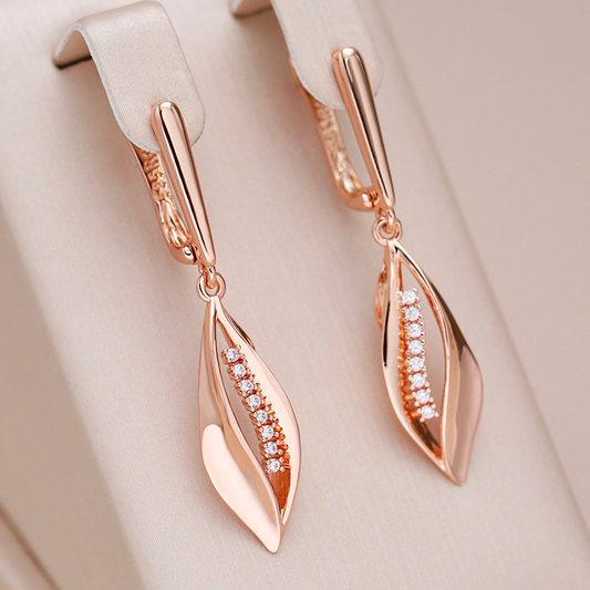 Glamorous rose gold earrings with sparkling zirconia tips