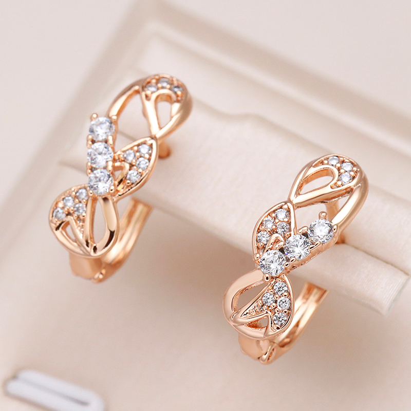 Elegant crystal earrings with sparkling gold bow