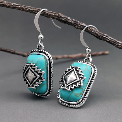 Elegant Ethno Earrings with Silver-Plated Finish and Radiant Turquoise Stone