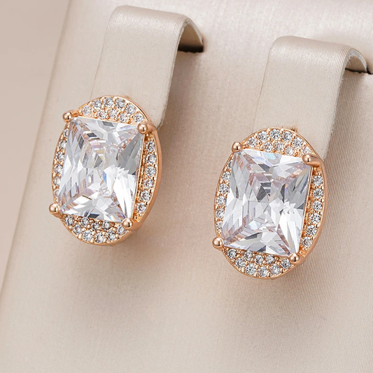 Elegant gold earrings with sparkling white crystals