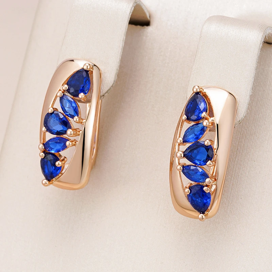 Elegant earrings with blue crystals and gold plating