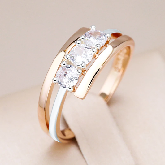 Elegant ring with radiant, gold-plated crystals