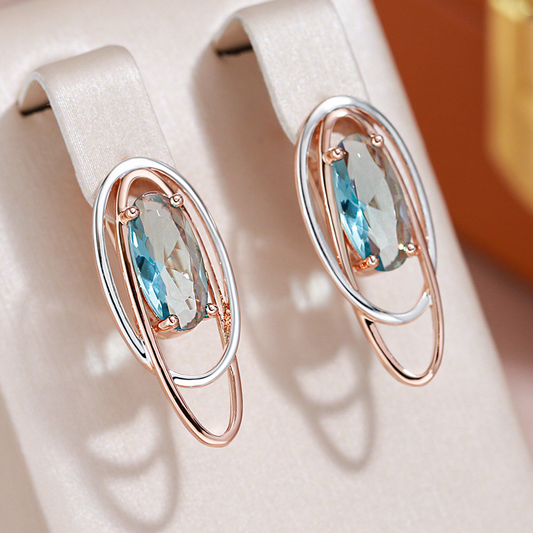 Chic earrings with sparkling turquoise crystals in elegant gold and silver