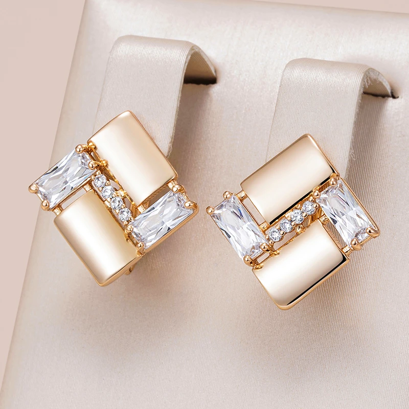 Elegant geometric gold earrings with sparkling zirconia stones