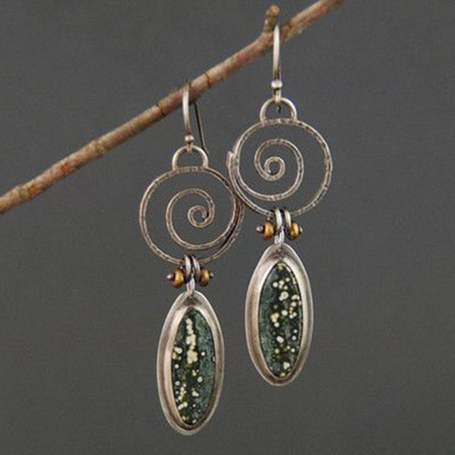 Elegant Vintage Earrings with a Bright Green Stone in Noble Silver