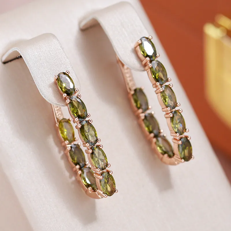 Glamorous gold earrings with sparkling crystals