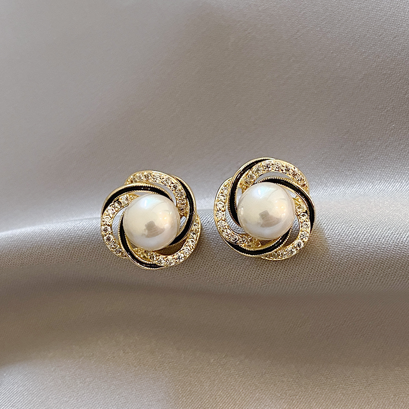 Sparkling golden ball earrings for a radiant look