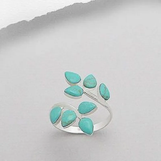 Elegant adjustable ring with radiant turquoise leaves