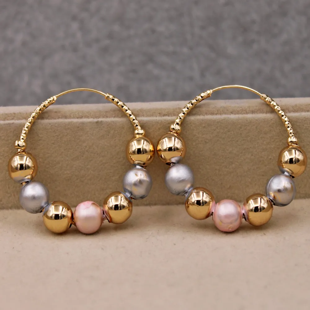 Elegant Vintage Balls in Gold – Shimmering Earrings for Any Occasion