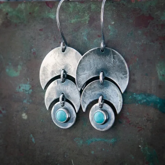 Elegant silver earrings with vintage turquoise accents