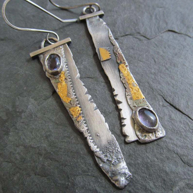 Elegant Vintage Silver Earrings in Saw Design