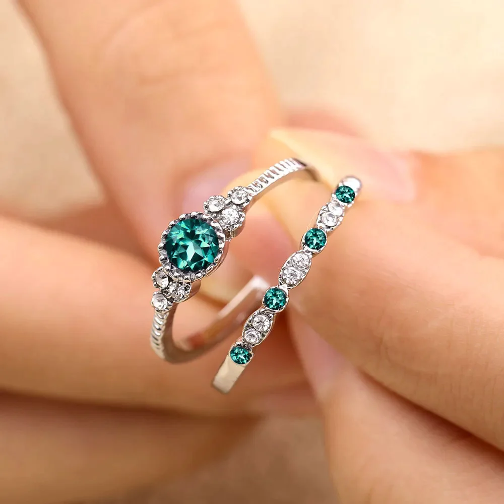 Shimmering ring made of green silver with sparkling zirconia stones