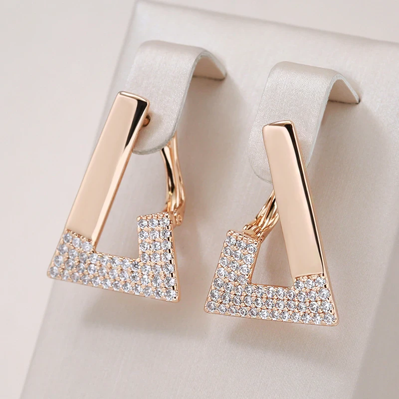 Elegant gold earrings in unconventional design