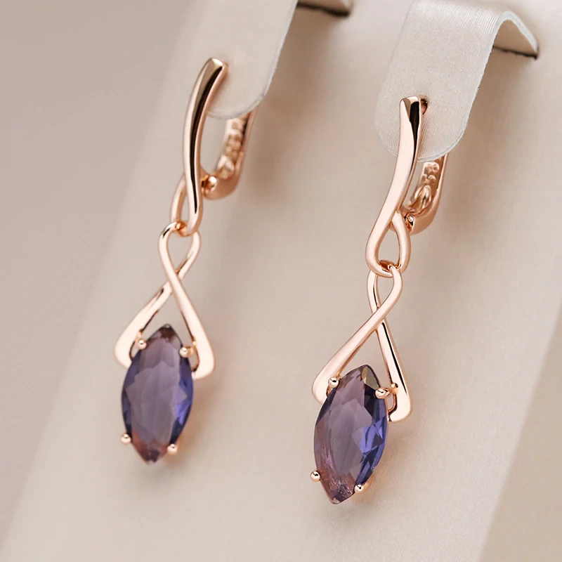 Stylish earrings with sparkling purple crystal