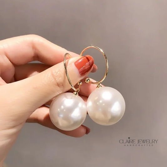 Elegant large pearl earrings