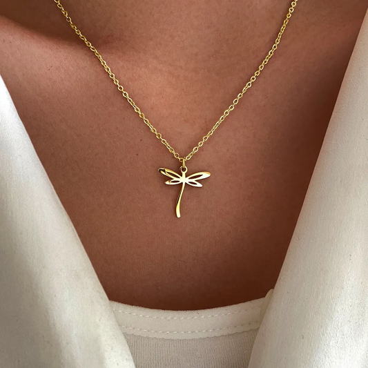 Elegant golden dragonfly necklace with hollow design