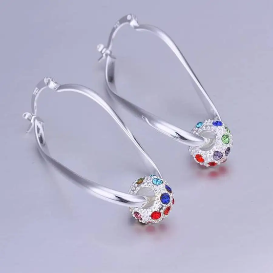 Colorful glitter earrings with stylish shimmering silver balls