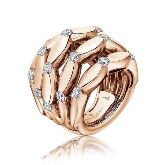 Elegant ring made of layered zirconium dioxide in a noble gold tone