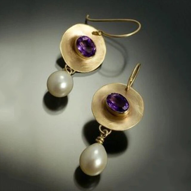 Elegant gold-plated vintage earrings with sparkling pearls and purple zirconias