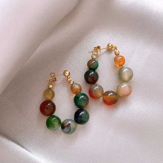 Fascinating earrings with sparkling, colorful gemstones