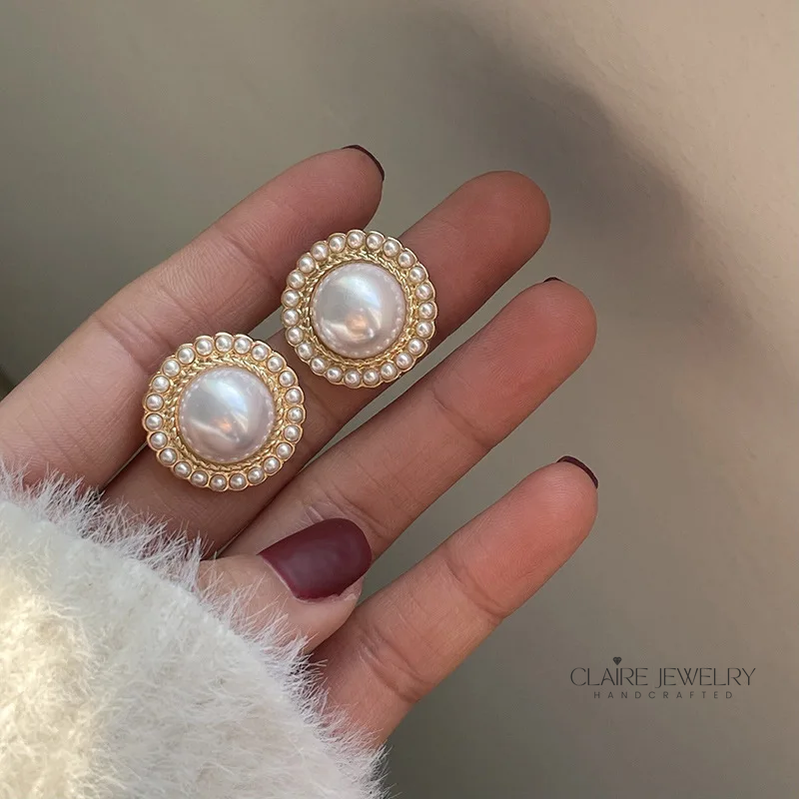 Elegant shiny pearl earrings