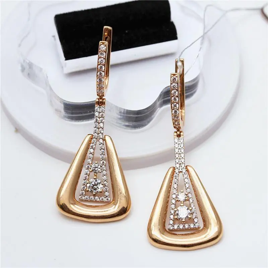 Elegant, radiant earrings with a finely gold-plated pendant