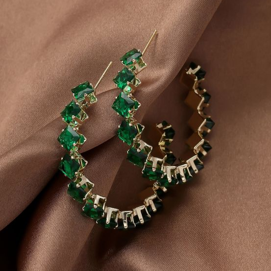 Elegant green earrings with golden accents