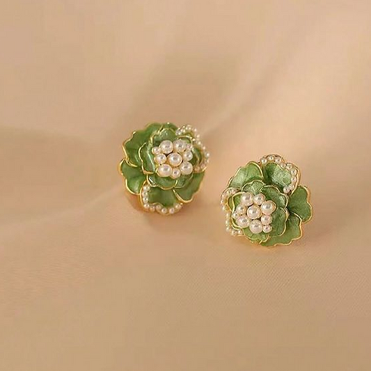 Fascinating enamel earrings with delicate floral designs and sparkling pearls