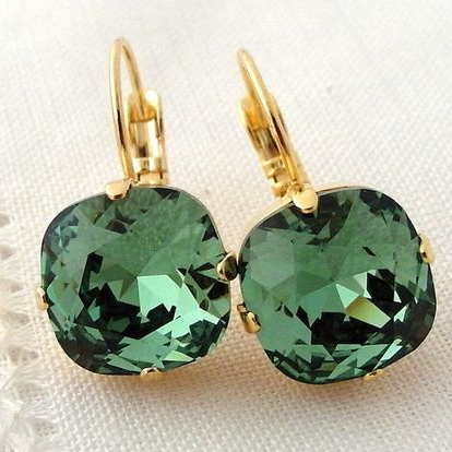 Elegant earrings with sparkling green zirconia