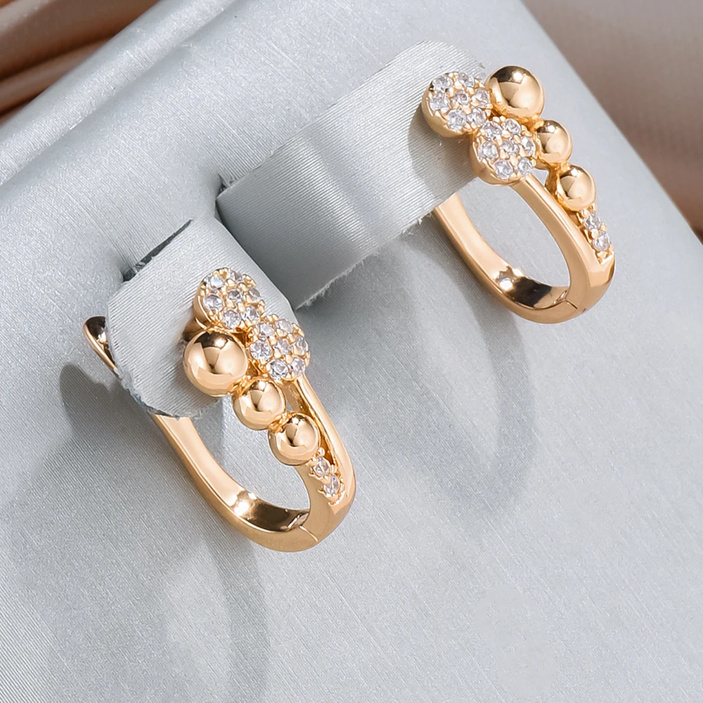 Radiant gold earrings with sparkling accents