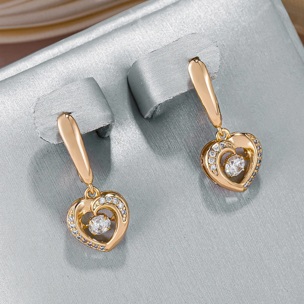 Beautiful gold earrings with an elegant, hollow heart design