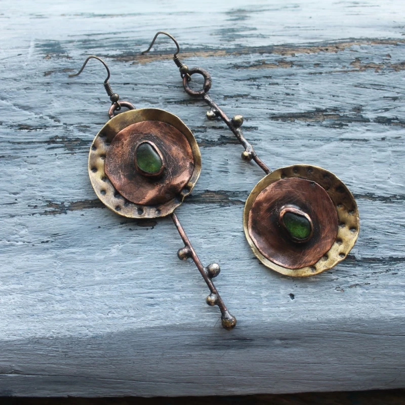 Timeless vintage earrings in soft brown with a slight fade