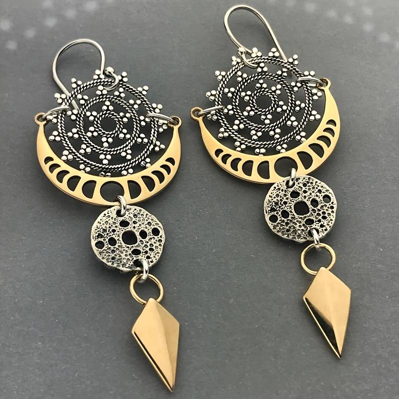 Elegant gold earrings in Egyptian style