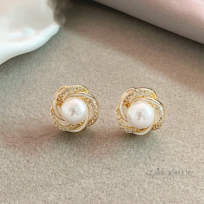 Elegant gold zirconia spiral pearl earrings