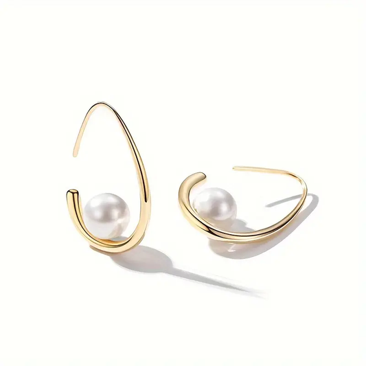 Stylish pearl earrings with a luxurious gold accent