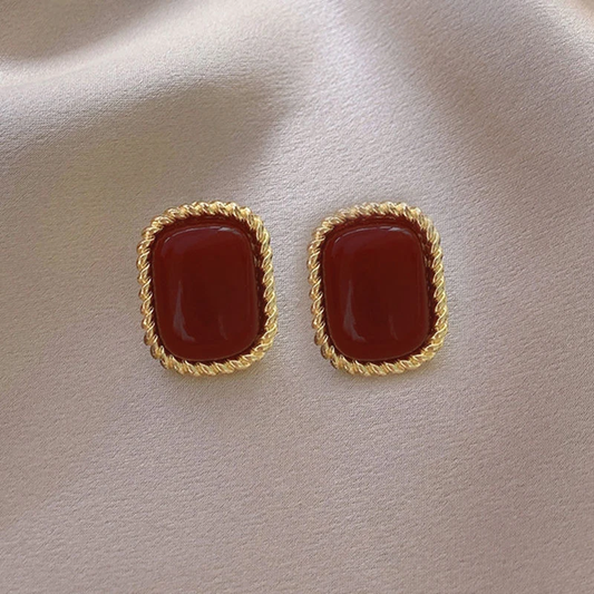 Luxurious red and gold earrings for a touch of glamour