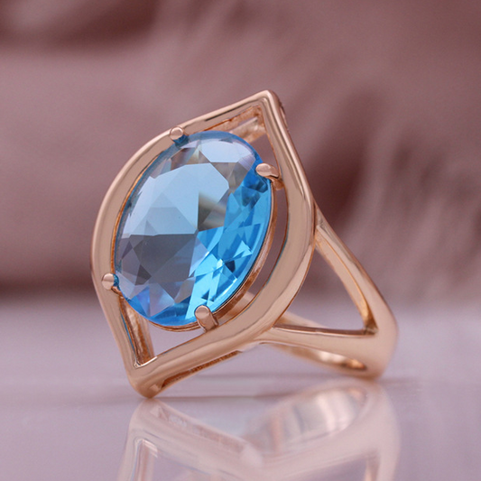 Elegant rose gold ring with sparkling blue crystal in vintage style