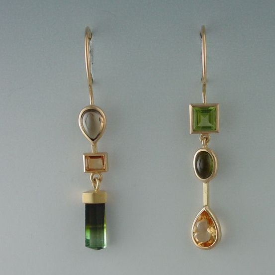 Stylish Vintage Earrings with Elegant, Shimmering Green Stones