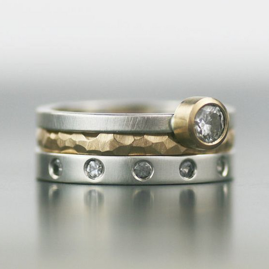 Elegant ring with layered gold and silver zirconia design