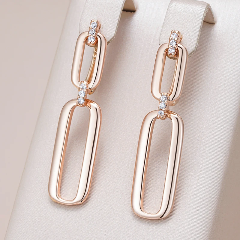 Elegant Golden Hanging Earrings with Hole Design